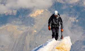 scalatore neve cima