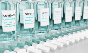 vaccini siringhe azzurro