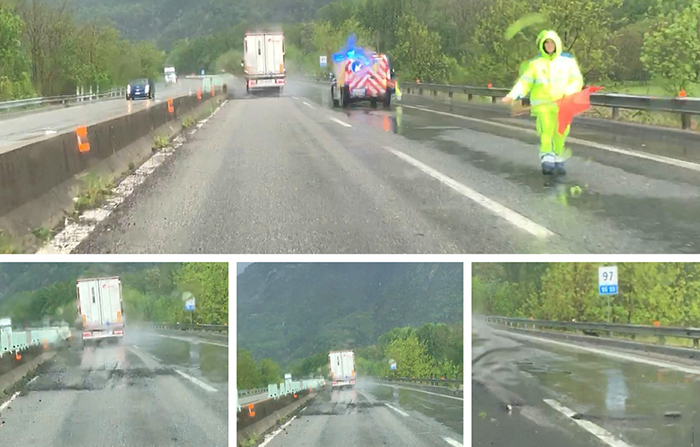 Mega buca in superstrada, in direzione nord. Operai al lavoro